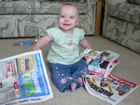 July 14/07 - Isabel reading the newspaper