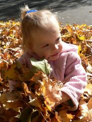 Oct 24/08 - Isabel playing in the leaves